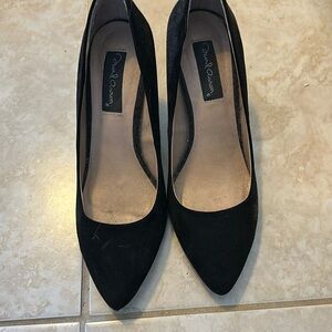 Black suede pumps